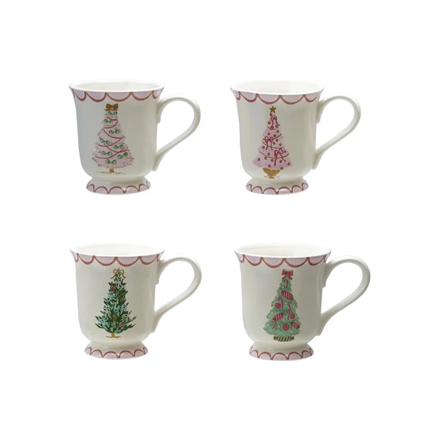 Set of 4 stoneware mugs with pink trim and illustrated Christmas trees in various styles