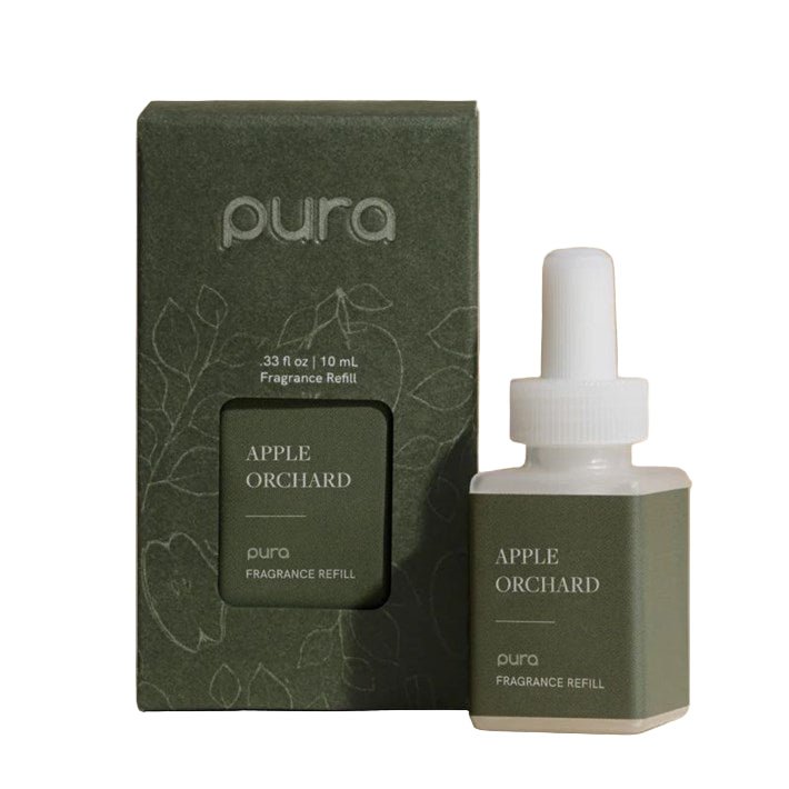 Apple Orchards Pura fragrance refill with red apple, warm spice, and creamy vanilla notes for a cozy autumn scent
