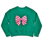 Green children’s sweatshirt with a large pink and white striped sequin bow on the front.
