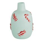 Light blue ceramic vase with red and white candy cane and peppermint accents.
