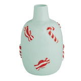 Light blue ceramic vase with red and white candy cane and peppermint accents.