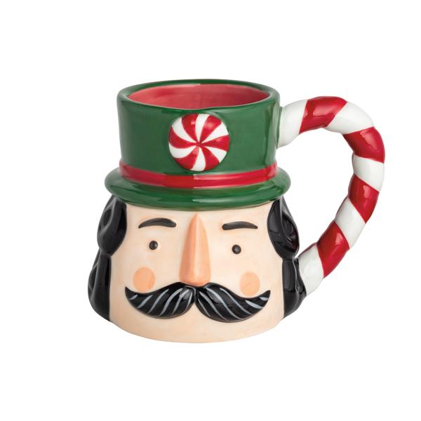 Green nutcracker mug with peppermint hat and candy cane handle.