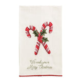 Cotton hand towel with embroidered candy canes, holly leaves, and red pom trim