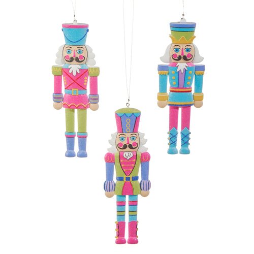 Set of three 6-inch multicolor Candy Shop Nutcracker cut out ornaments designed by Haley Bush.