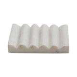 White carved marble soap dish with grooved design