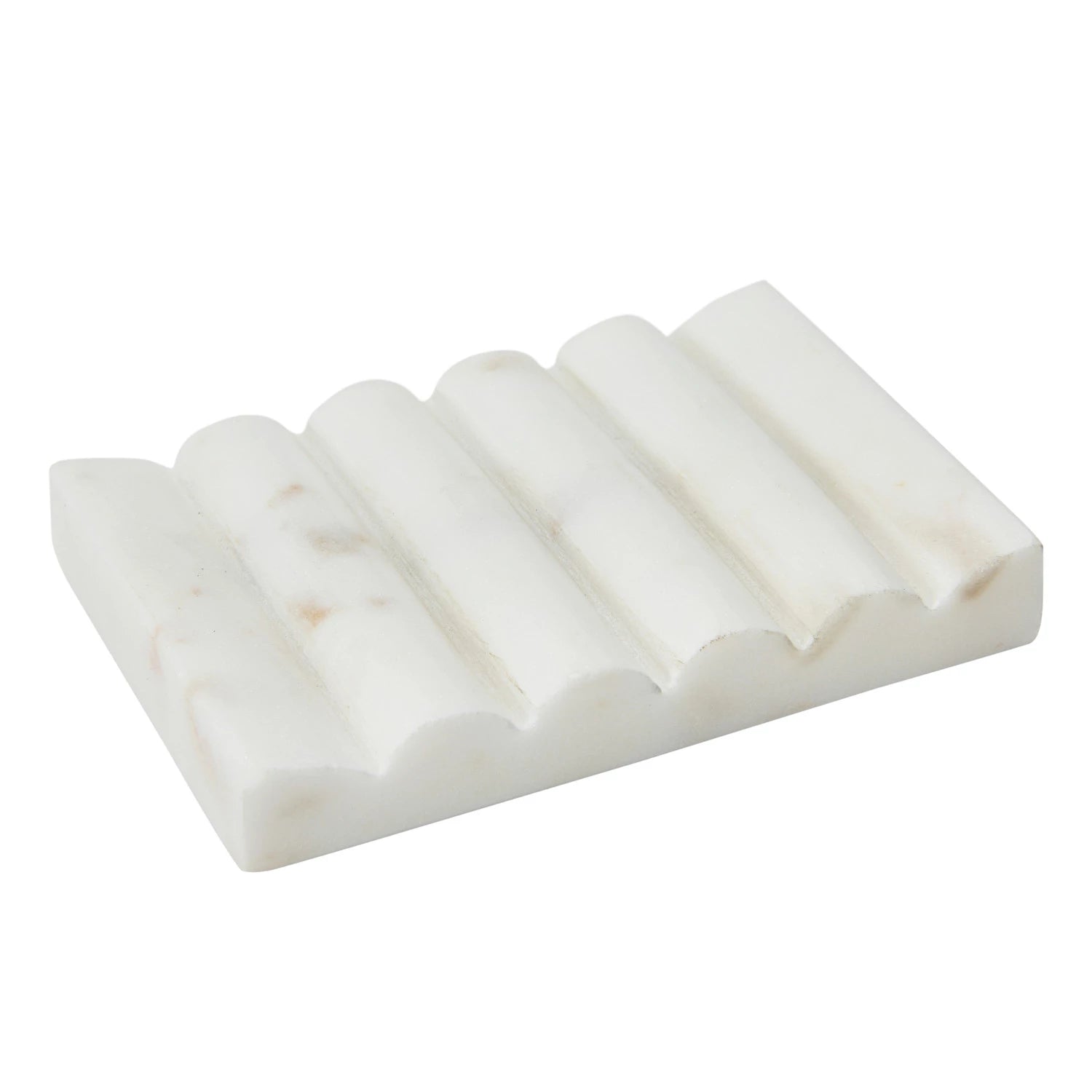 White carved marble soap dish with grooved design
