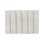 White carved marble soap dish with grooved design