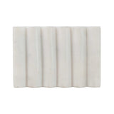 White carved marble soap dish with grooved design