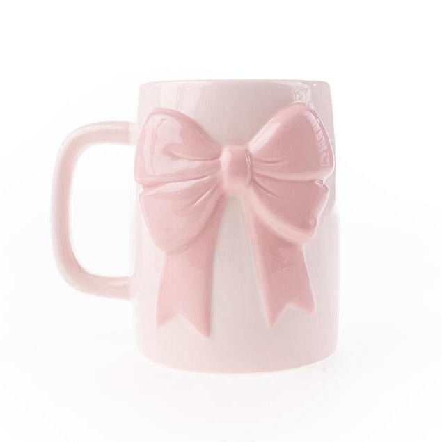 Mary Square pink ceramic mug featuring 3D bow detail.