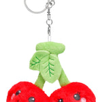 Plush cherries keychain with smiling embroidered faces and green leaf topper, attached to silver clip.