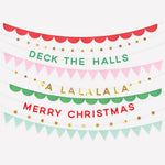 Christmas garland set with red, green, pink, and gold banners featuring festive text and star details