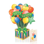 A colorful pop-up card showing balloons emerging from a striped gift box with "Happy Birthday" banner