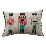Rectangular holiday pillow with three colorful nutcrackers and beaded accents