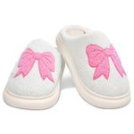 Children’s Cozy Bow slippers made of chenille with pink embroidered bow design and skid-resistant sole.