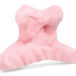 Clear zip pouch containing four plush fuzzy hair clips in pastel white, pink, purple, and blue