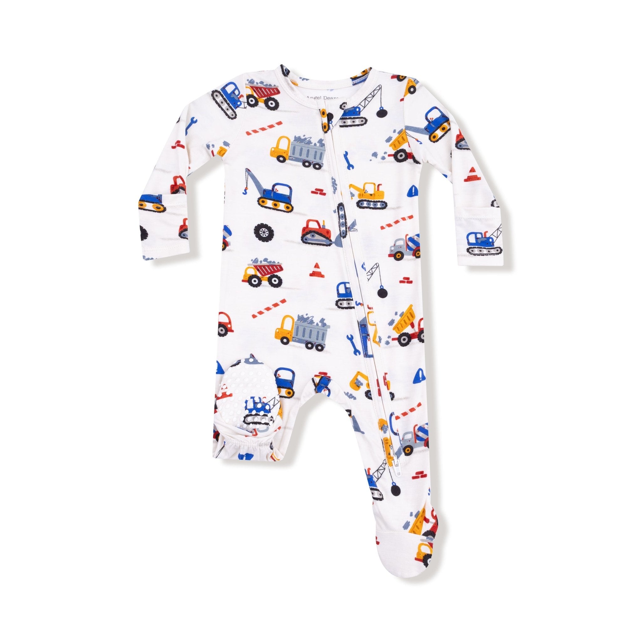 White baby footie pajama with colorful construction trucks and crayon-style illustrations.