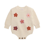 Cream knit baby sweater bubble with crochet daisies and button leg closure