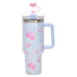  Light blue floral travel cup with pink bow straw topper and side handle