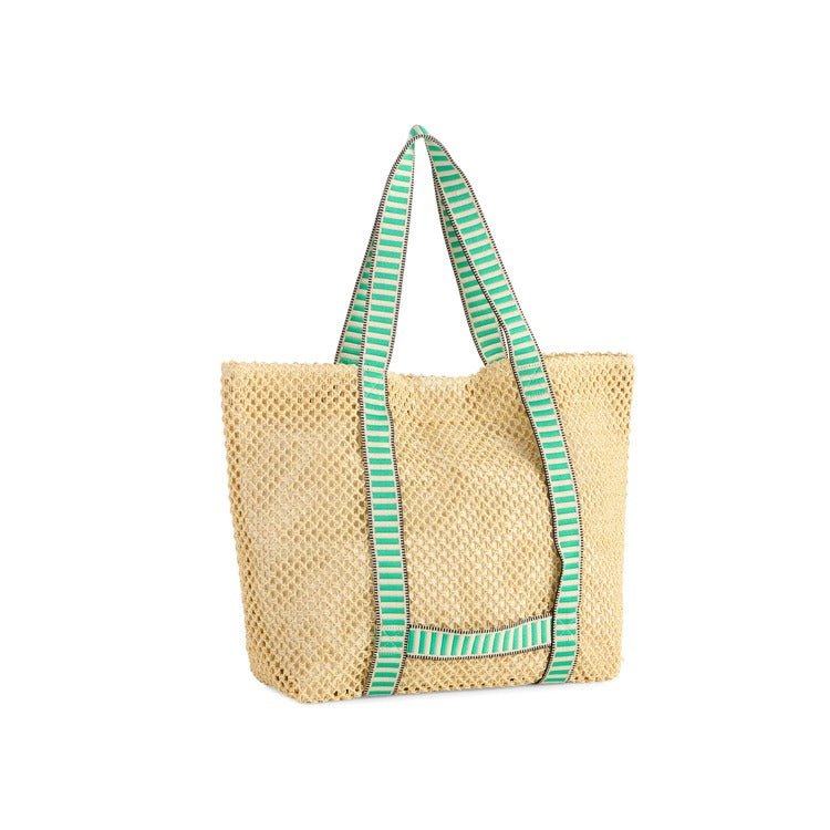 Woven bag with green striped handles on a white background