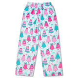Children’s Fancy Trees plush pants with festive pink and teal Christmas tree print, elastic waistband, and front pockets.