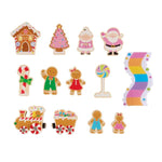 13-piece gingerbread wood toy set with Santa, candy decorations, train, and rainbow road in clear gift tube