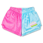 Children’s color block shorts in pink and blue with rainbow cake patch and back pocket