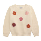 Beige sweater with flower patterns on a white background