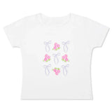 White children’s t-shirt with pink floral bouquets and lavender bows design