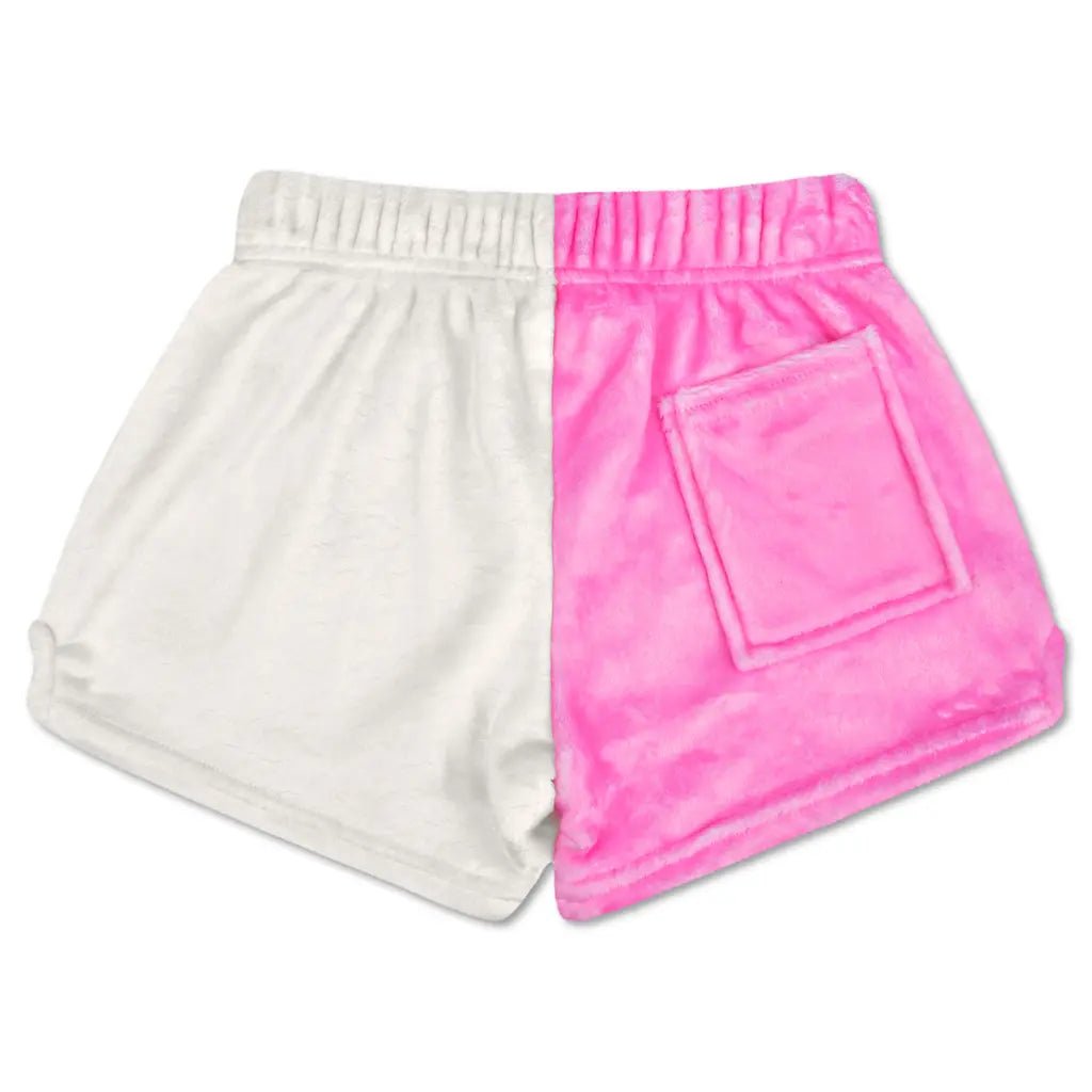 Children’s color block shorts in pink and white with smiley face patches and back pocket