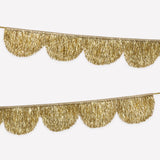 Gold scalloped tinsel garland with glitter ribbon for holiday decorating
