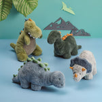 Green faux fur dinosaur plush with weighted bottom and soft spine details