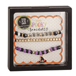 A packaged set of Halloween-themed bracelets with spooky designs, displayed in a clear box against a white background.