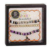 A packaged set of Halloween-themed bracelets with spooky designs, displayed in a clear box against a white background.