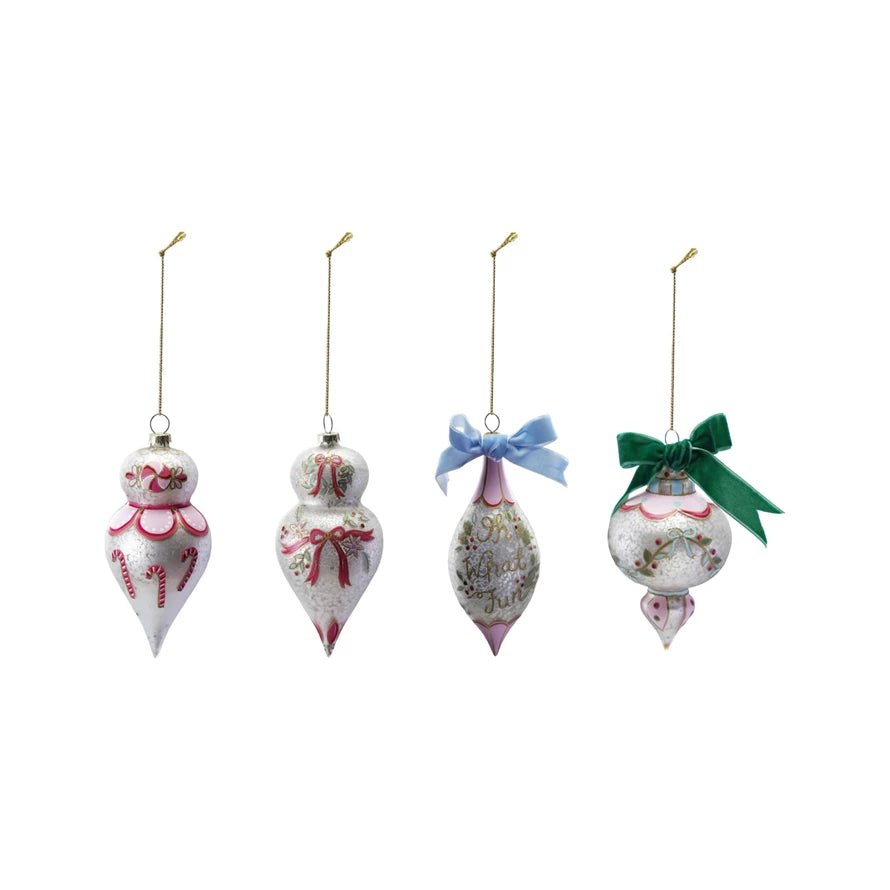 Four antique-inspired hand-painted glass ornaments with velvet bows in red, green, and blue