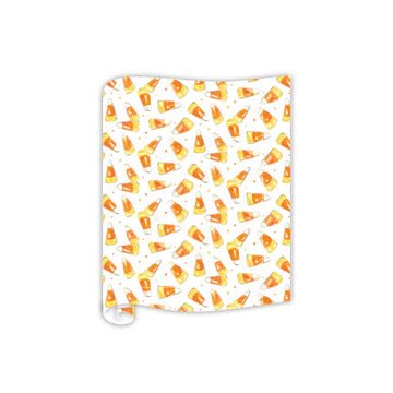 Table runner with all-over candy corn pattern in orange and yellow