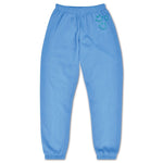 Light blue sweatpants with a smiley face design on a white background