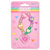 Colorful beaded heart bracelet with strawberry-scented lip gloss charm on pink packaging
