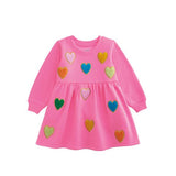 Pink toddler sweatshirt dress with multicolored boucle hearts and long sleeves