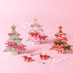4-piece holiday bow hair clip set with acrylic icon clips and bobby pins on Christmas tree display card