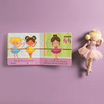 Children's book with illustrations of ballerinas on a purple background, accompanied by a doll in a ballet outfit.