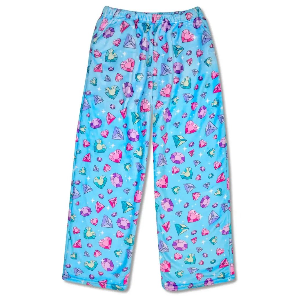 Children’s Jazzy Jewels plush pants with bright gemstone print on blue fabric, elastic waistband, and front pockets.