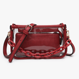 Red handbag with a clear section and chain detail on a white background