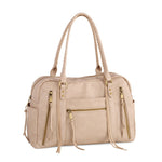 Stone-colored vegan leather bowling bag with gold zippers and multiple compartments