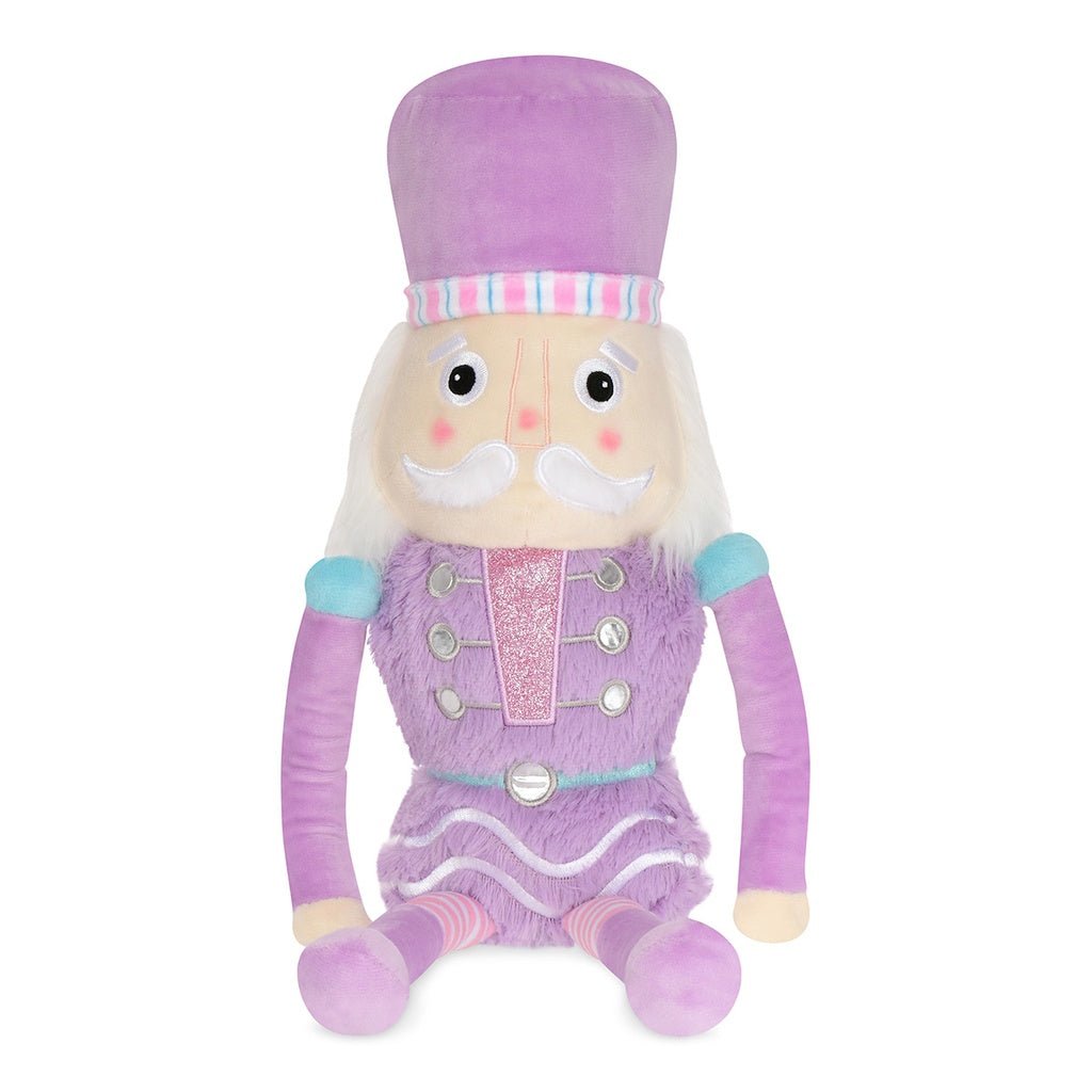 Lavender Nutcracker plush toy with faux fur, fleece, glitter embroidery, and pastel accents, measuring 18 inches tall.