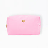 Pink pouch with a gold clasp on a white background