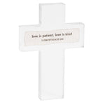 Set of three cross-shaped signs with inspirational quotes on a white background