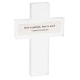 Set of three cross-shaped signs with inspirational quotes on a white background