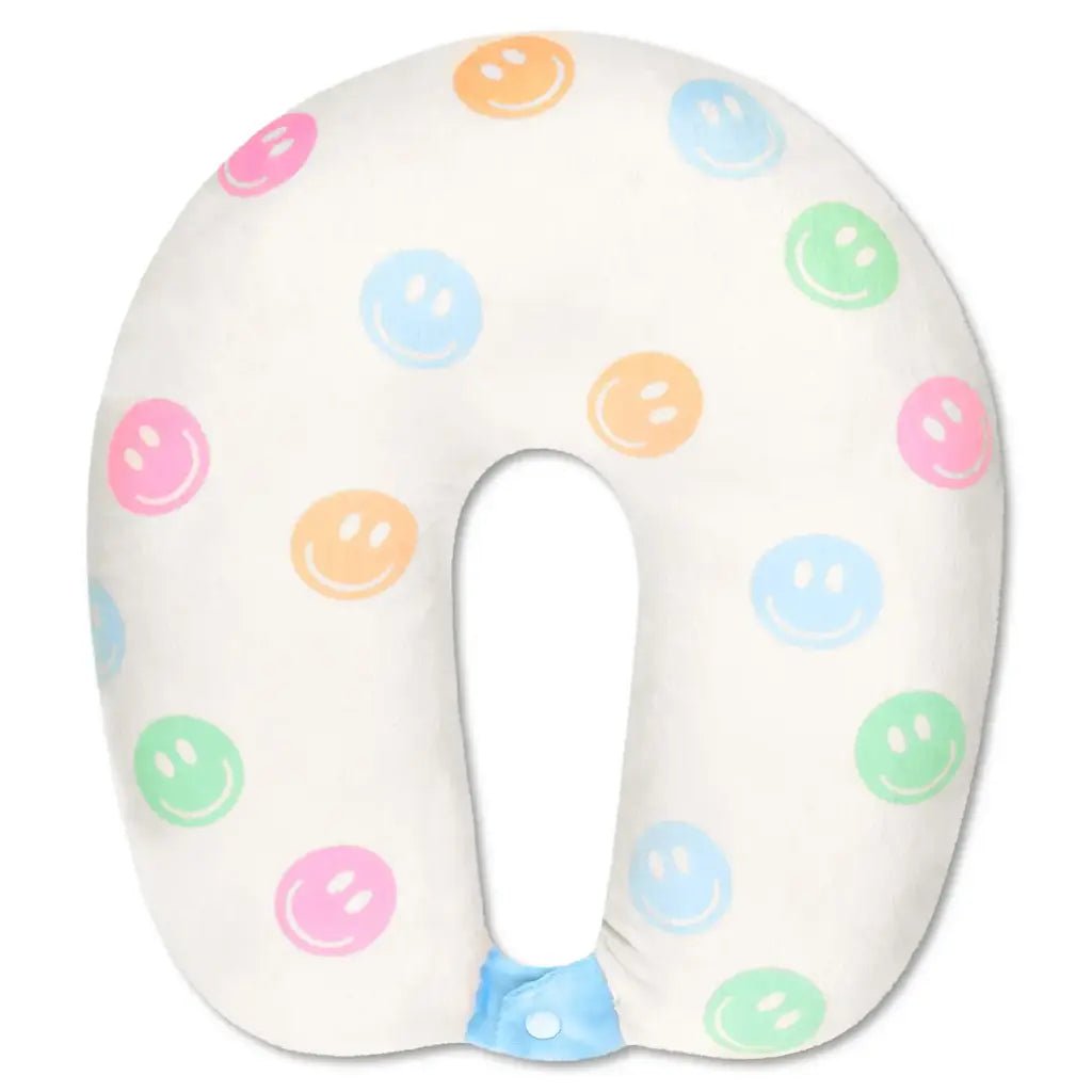 Fleece neck pillow with embroidered pastel smiley faces and snap closure.