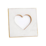 Square marble tile with a heart-shaped cutout on a white background