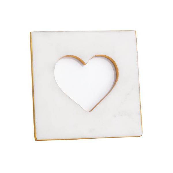 Square marble tile with a heart-shaped cutout on a white background